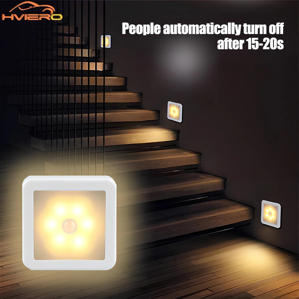 LED stair lights on a staircase with automatic turn-off feature, brand 'HVIERO' visible.