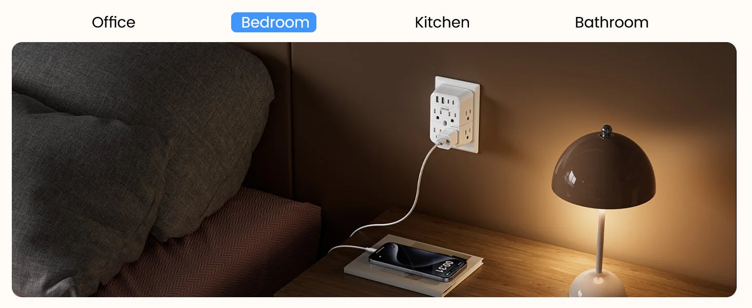 Lamp on a nightstand next to a power outlet with labeled 'Bedroom' above.