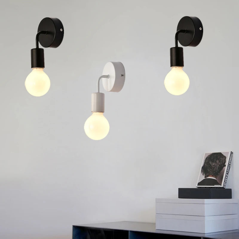Black minimalist wall sconce for bedroom and hallway lighting