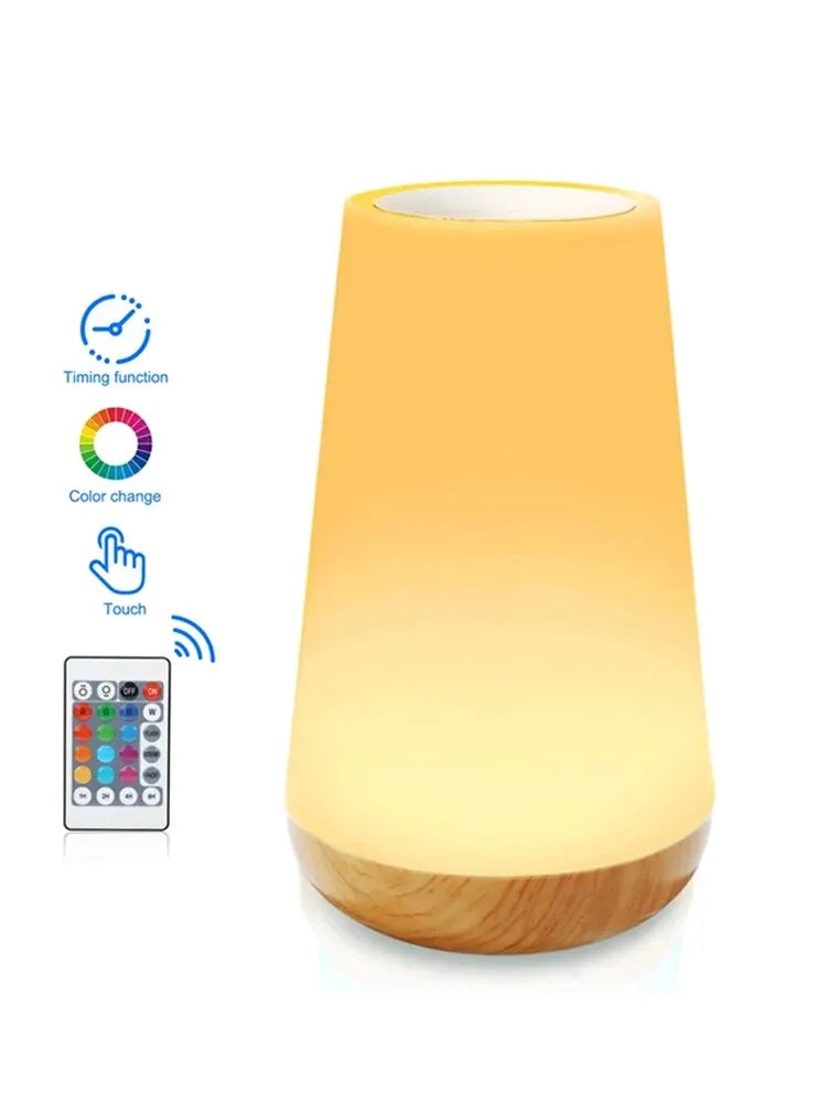 Portable rechargeable night lamp illuminating a bedside setup